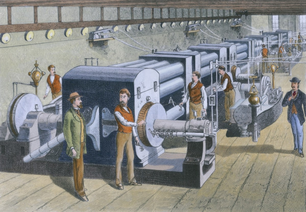 Homens trabalhando na sala de controle elétrico de uma estação, em texto sobre Revolução Industrial.